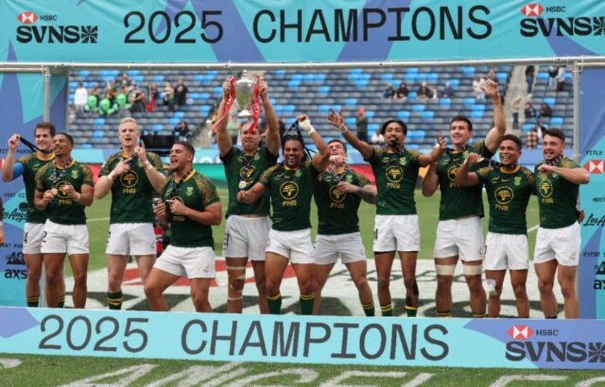 South Africa poses with the trophy after winning the Men's 2025 HSBC Rugby Sevens LA World