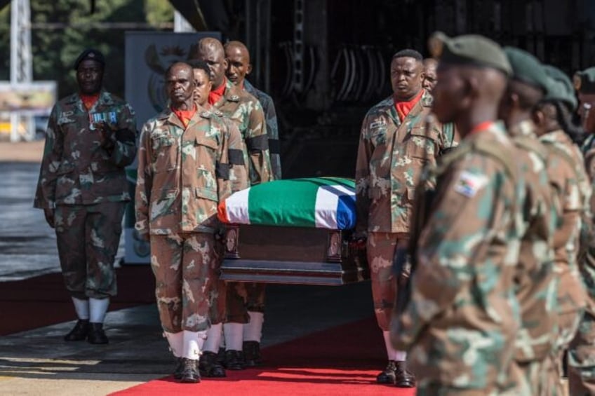 The bodies of two South African soldiers killed in a mortar attack in the Democratic Repub