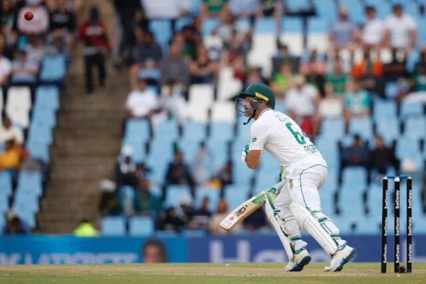 South African Dean Elgar watches the ball after playing a shot during the second day of the first Test match against India in Centurion.