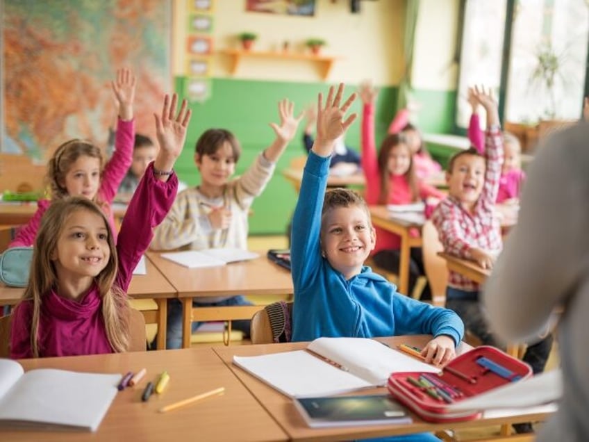 happy schoolkids engage in learning