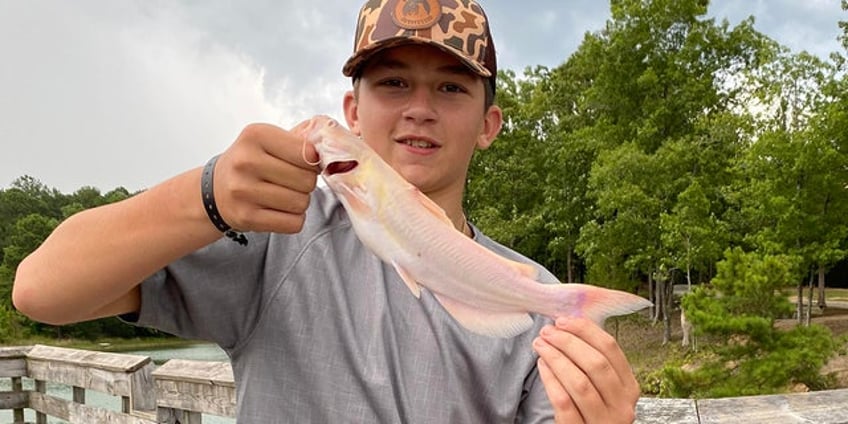 south carolina teen fishes for catfish for the first time reels in extremely rare find