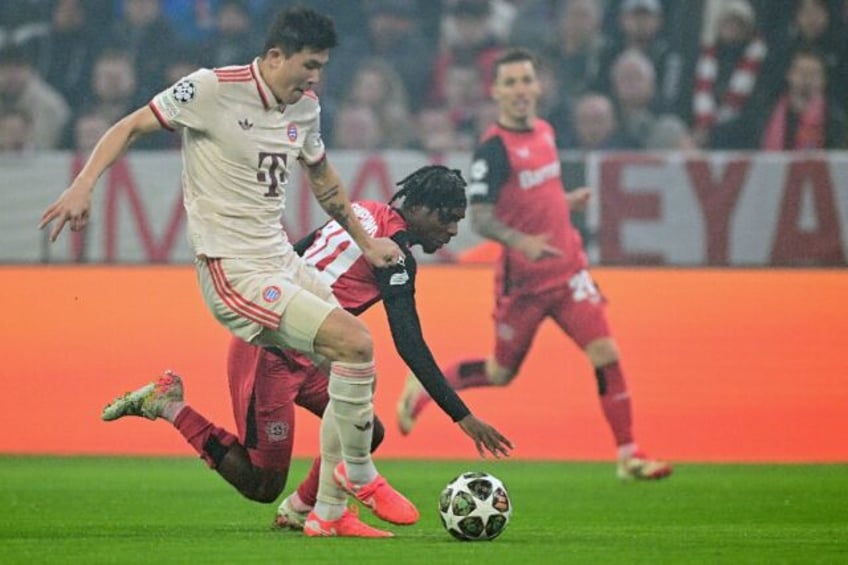 Kim Min-jae (L) will miss several weeks of action for Bayern Munich after picking up an A