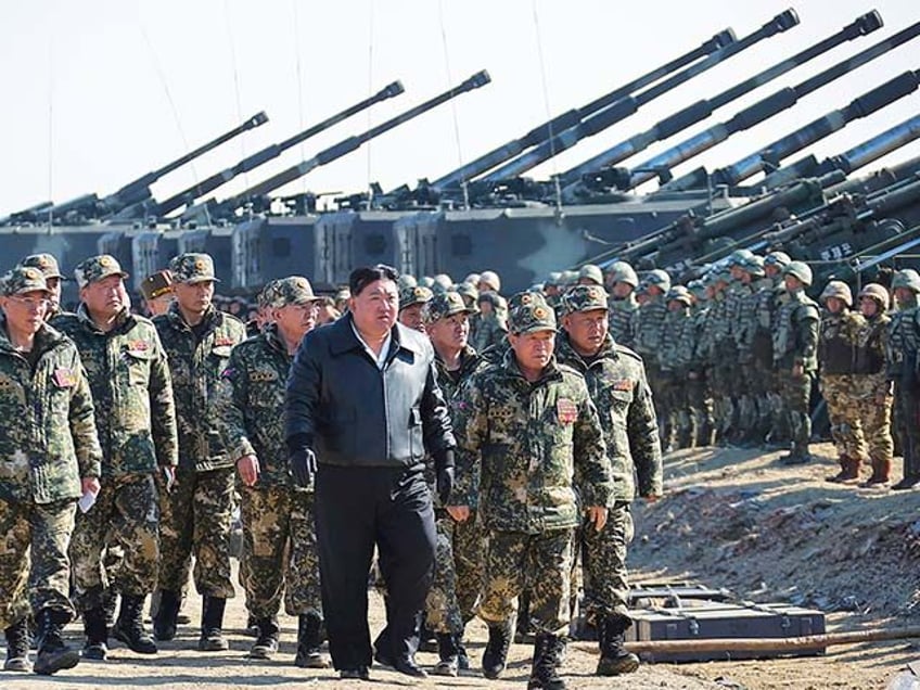 In this photo provided by the North Korean government, North Korean leader Kim Jong Un, ce