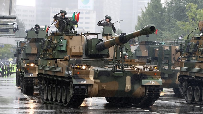 south korea flexes military muscle with parade issues dire warning about norths nuclear pursuit