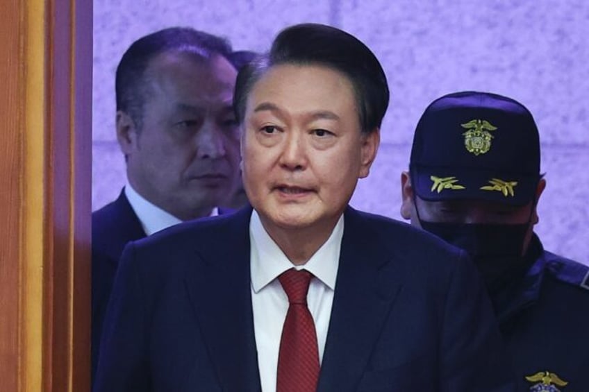 Impeached South Korean President Yoon Seok Yeol was indicted Sunday over his martial law d