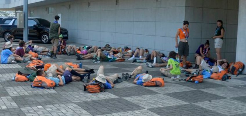 south korea presses on with world scout jamboree as heat forces thousands to leave early