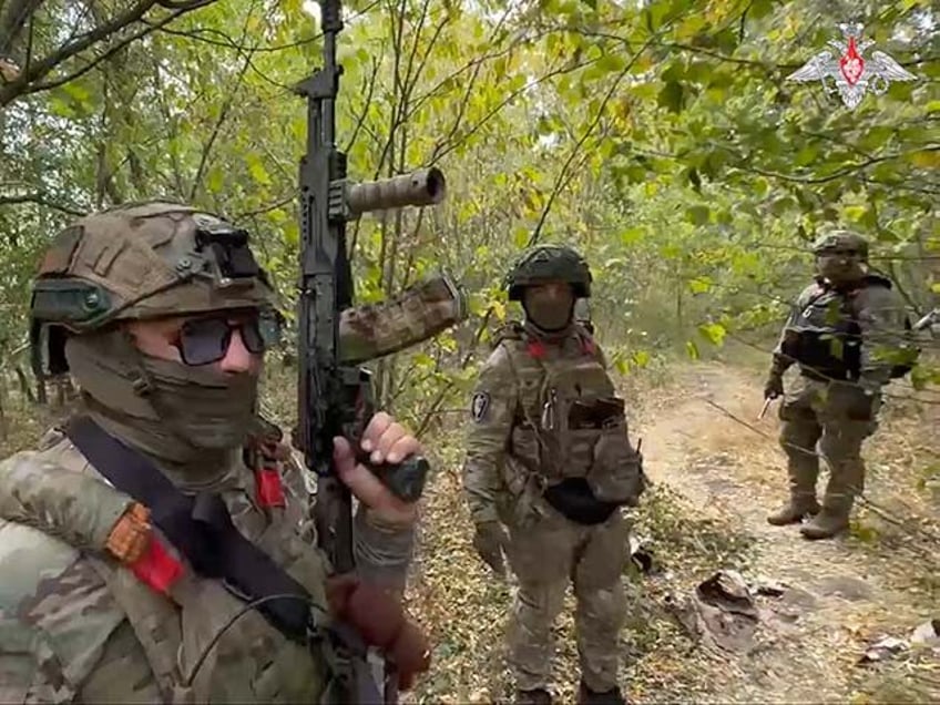 In this photo taken from a video released by the Russian Defense Ministry on Monday, Sept.