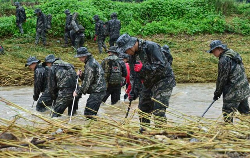 south korea searches for missing people as death toll from downpours reaches 41