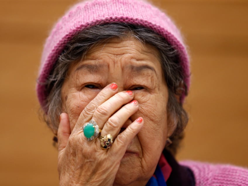 Kang Il-chul, a South Korean woman abused by Japan's wartime military-run brothel system, speaks during a press conference in Tokyo, Tuesday, Jan. 26, 2016. Two elderly South Korean women, Kang and Lee Ok-sun,are in Japan to reject a recent settlement agreement between the two governments and demand that Prime Minister Shinzo Abe give them a face-to-face apology and formal compensation. (AP Photo/Shizuo Kambayashi)