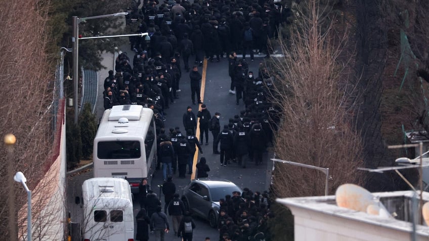 Officers close in on Yoon residence