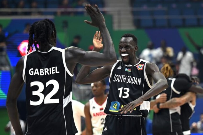 south sudan japan grab olympic spots at basketball world cup