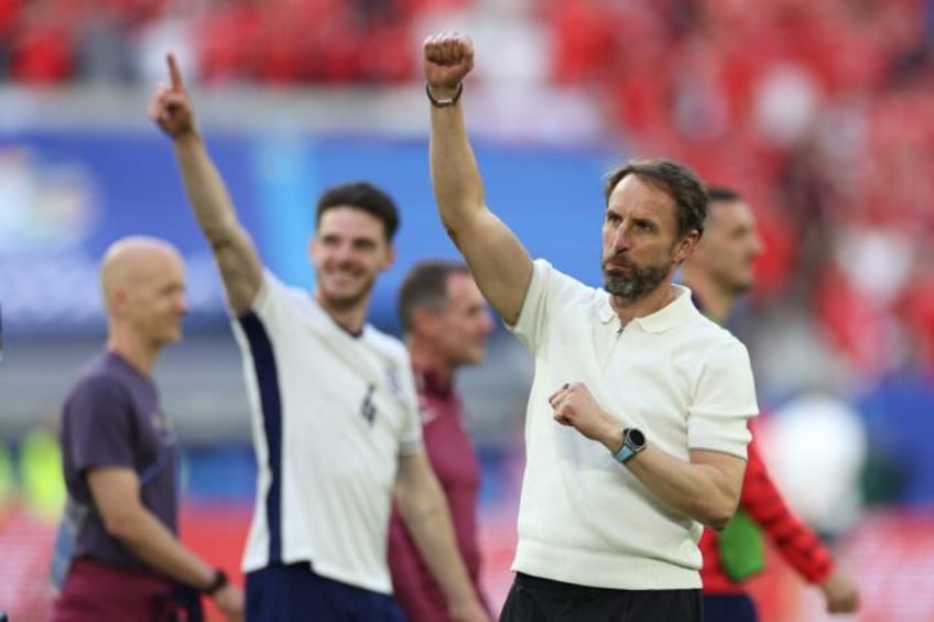 Gareth Southgate celebrates after England qualified for the Euro 2024 semi-finals with a p