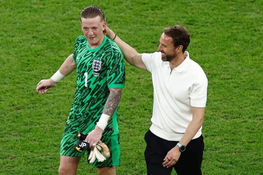 Gareth Southgate congratulates Jordan Pickford after England's Euro 2024 win against Slova