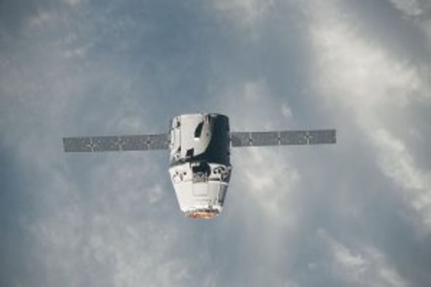 Space station-bound Dragon supply capsule filled with everything from experiments to coffe