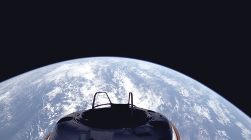 This handout image released by SpaceX on September 10, 2024 shows a view of Earth and the