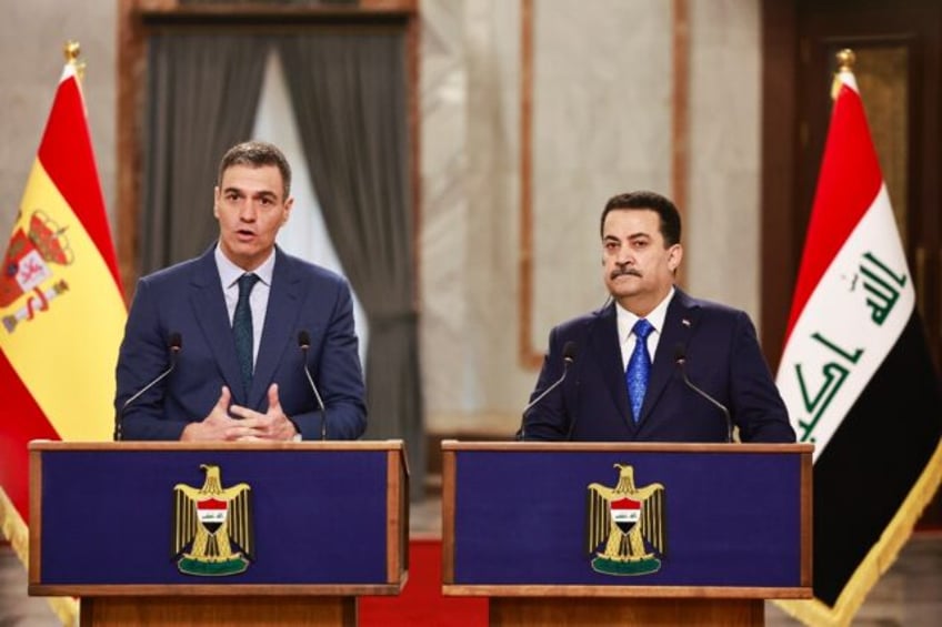 Iraq's Prime Minister Mohamed Shia al-Sudani (R) and Spain's Prime Minister Pedro Sanchez in Baghdad