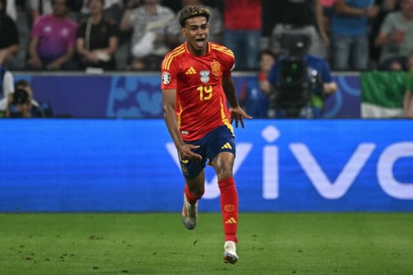 Lamine Yamal celebrates scoring against France in the Euro 2024 semi-final