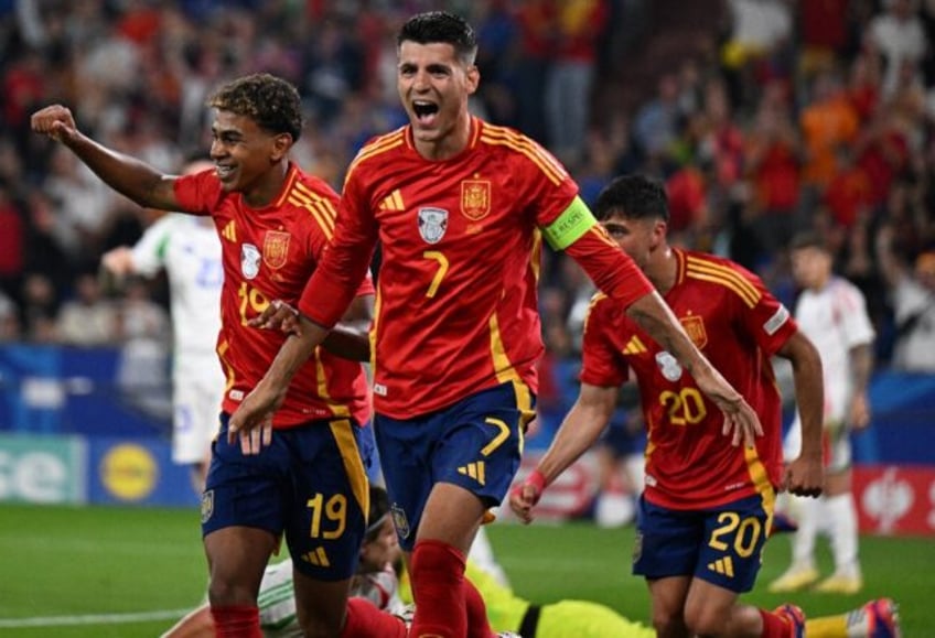 Alvaro Morata (C) celebrates during Spain's win over Italy. Spain were the most impressive