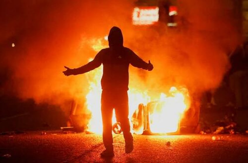 spanish citizens riot after elderly man brutally assaulted by migrants