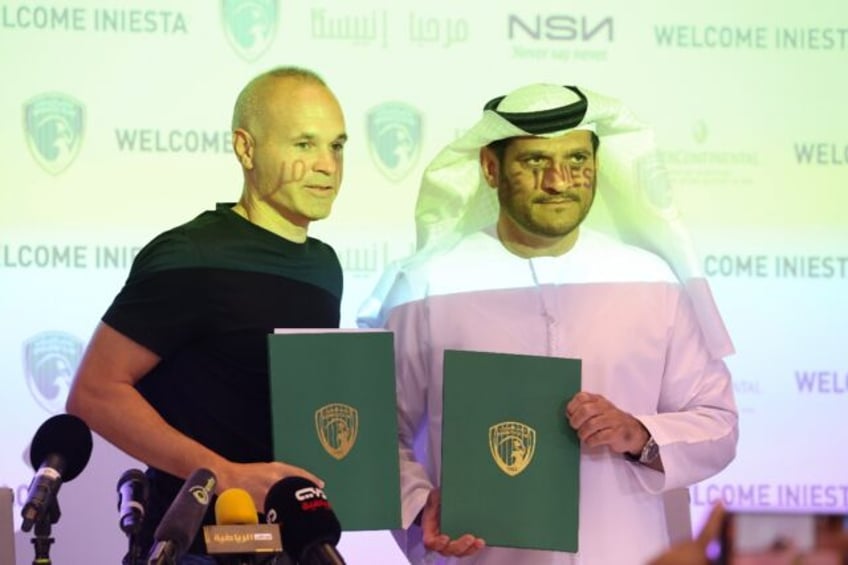 spanish star iniesta opens new page with emirates