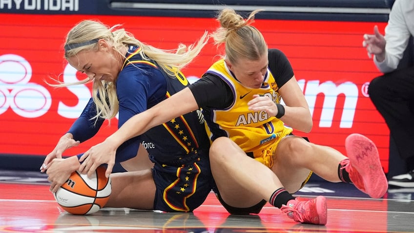 Sophie Cunningham fights for the ball