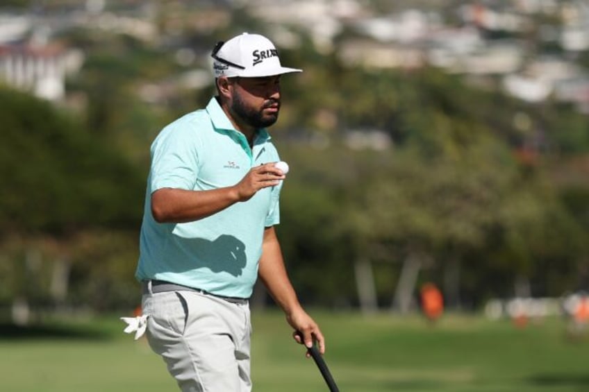 American J.J. Spaun fired a five-under par 65 to grab a one-stroke lead after the third ro