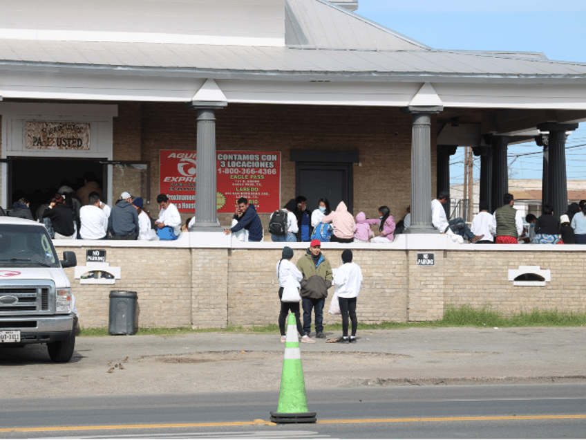 Migrant gather in Eagle Pass, Texas, after being released by Border Patrol. (Randy Clark/Breitbart Texas)