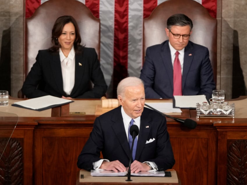 President Joe Biden speaks during the State of the Union address on Capitol Hill, Thursday, March 7, 2024, in Washington, as Vice President Kamala Harris and House Speaker Mike Johnson of La., watch. (AP Photo/Mark Schiefelbein)