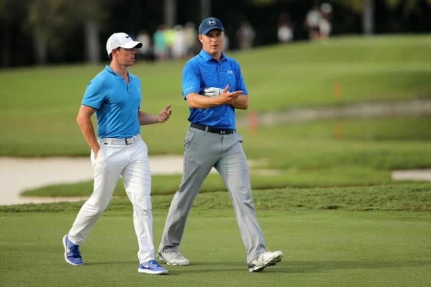 American Jordan Spieth, right, seeks a PGA Championship victory to complete a career Grand