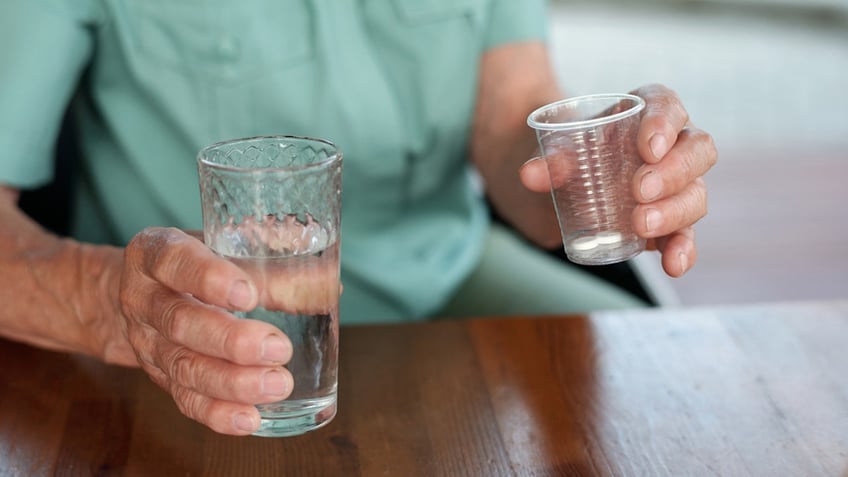 Man holding water