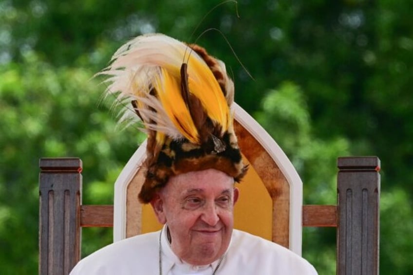 Pope Francis takes part in a meeting with Catholic faithful of the diocese of Vanimo in fr