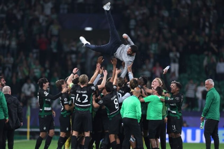 Sporting Lisbon boss Ruben Amorim was tossed in the air by his celebrating players