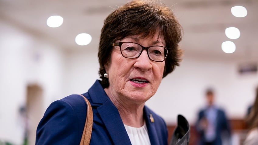 Susan Collins speaking to reporters