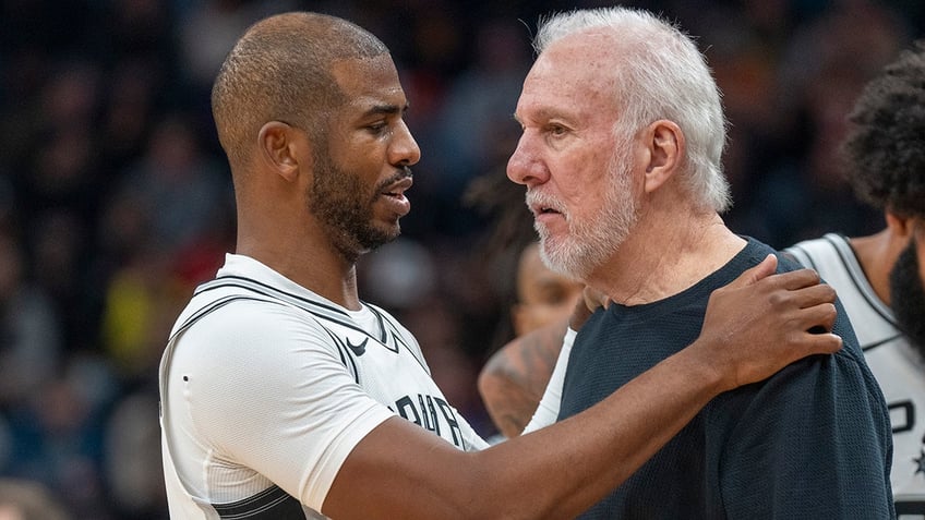 Chris Paul and Gregg Popovich