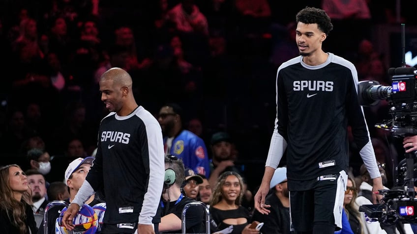 Victor Wembanyama and Chris Paul compete in the skills challenge