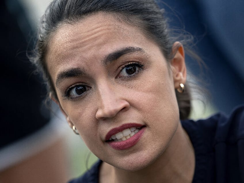 squad member aoc shouted down by protesters chanting close the border