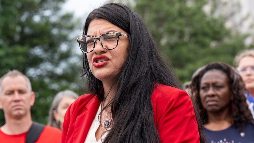 squad member rashida tlaib calls biden enabler of genocide at conference linked to terrorist group ccp