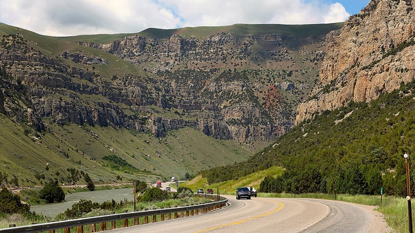 The Wind River and U.S. Highway 20 run through a deep and scenic canyon between the towns of Shoshoni and Thermopolis in central Wyoming. 