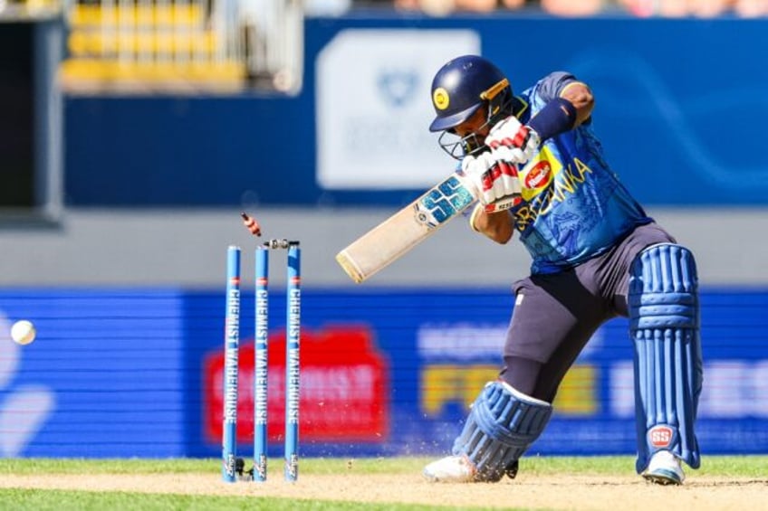 Sri Lanka's Wanindu Hasaranga is bowled by New Zealand's Matt Henry during their third one