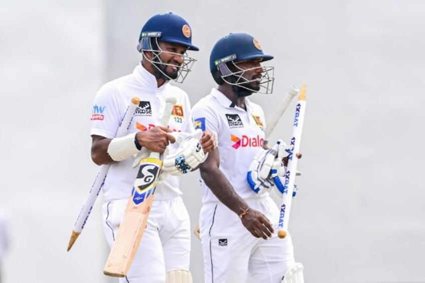 Dimuth Karunaratne (left) and Nishan Madushka (right) needed just 7.2 overs to reach the target set by Afghanistan