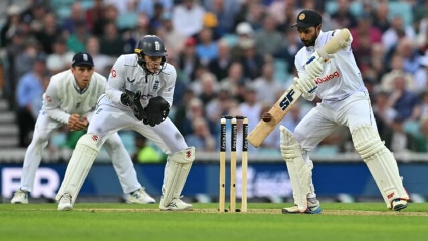 Resistance: Sri Lanka captain Dhananjaya de Silva on his way to 64 not out against England