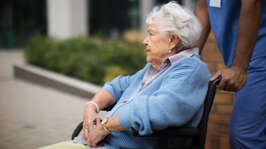 Woman outside wheelchair