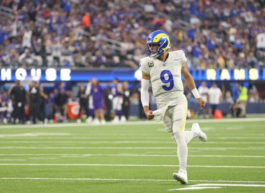 Los Angeles Rams quarterback Matthew Stafford celebrates a touchdown in an NFL victory ove