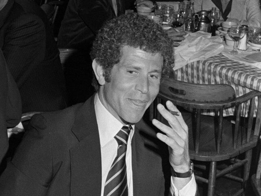 Tony Roberts (foreground) attends a party at Gallagher's in New York City on April 18, 197