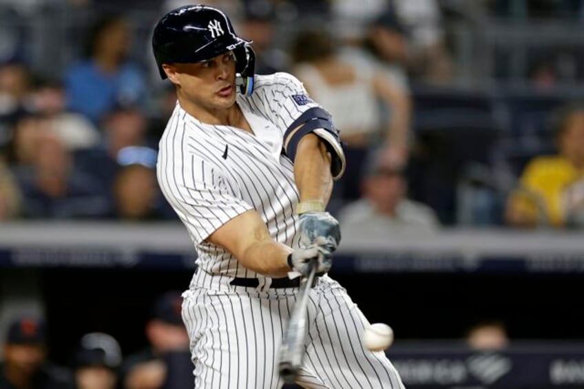 stanton hits his 400th home run to lead cole and the yankees to a 5 1 victory over the tigers