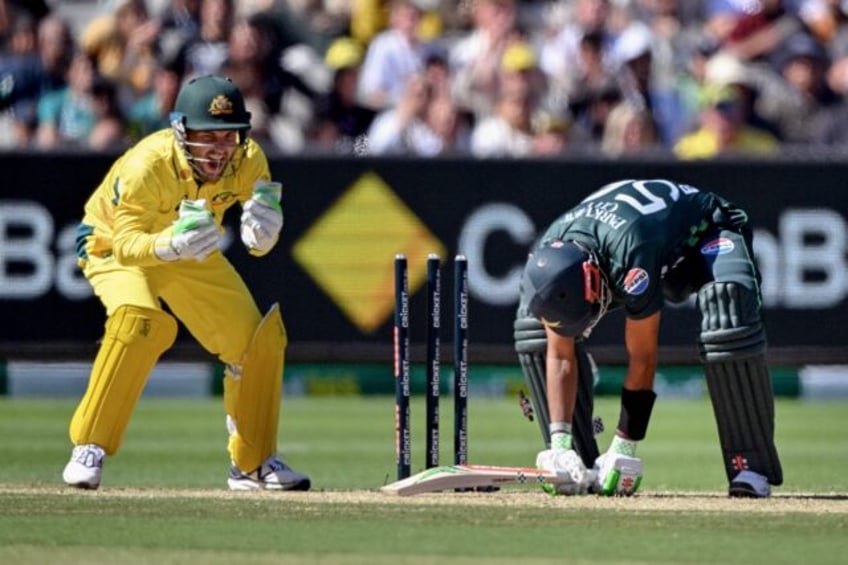 Australia wicketkeeper Josh Inglis reacts after Pakistan's Mohammad Rizwan was dismissed d