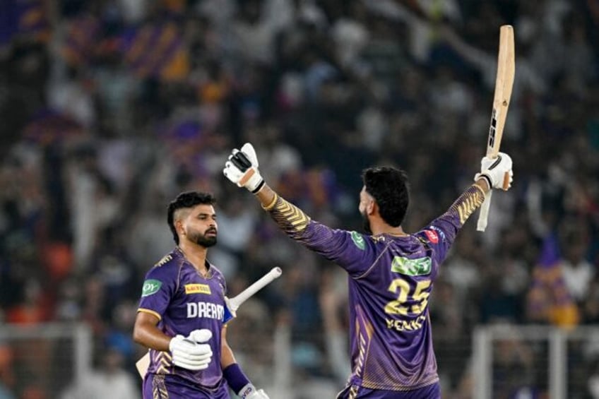 Kolkata Knight Riders' captain Shreyas Iyer (L) and Venkatesh Iyer celebrate after smashin