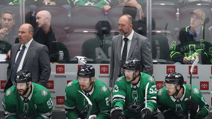 Pete DeBoer looks on during Dallas Stars game