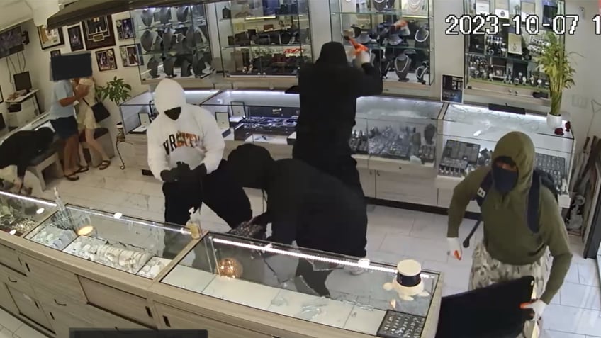 Smash and grab robbers in jewelry store