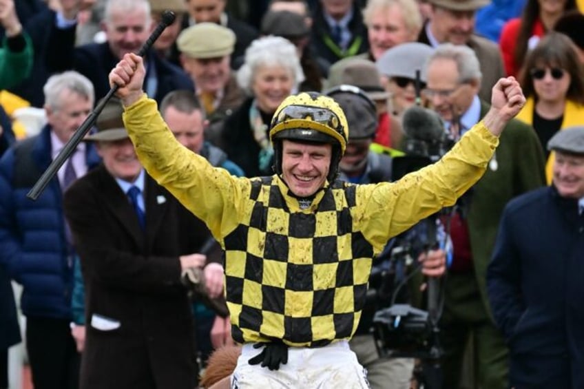 Paul Townend celebrates after victory in the Champion Hurdle on State Man